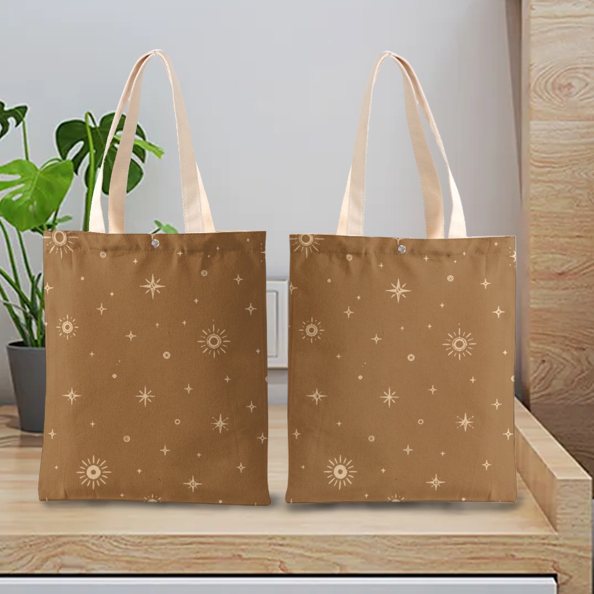 Solar Compass golden-brown canvas tote bag with celestial sun and star artwork