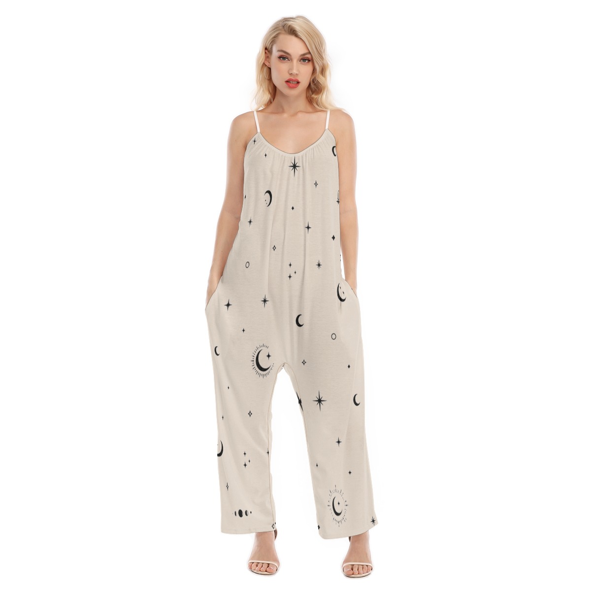 Front view of loose cami jumpsuit with moon and star print