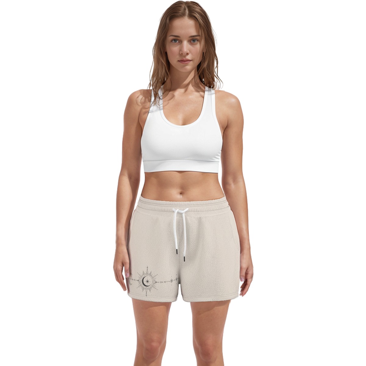 Front full view of beige active shorts with white drawstring and moon graphic near the left hem