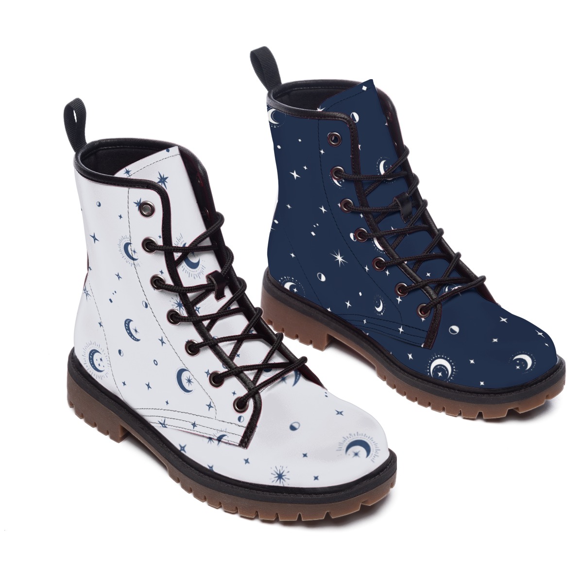 Pair of lace-up boots with white and navy celestial prints, angled front view