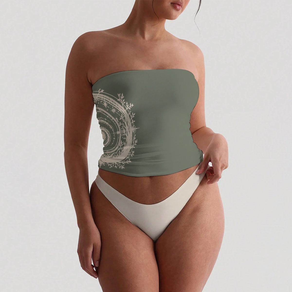 Front view of sage green bandeau top with white celestial side print and high-cut cream bottoms